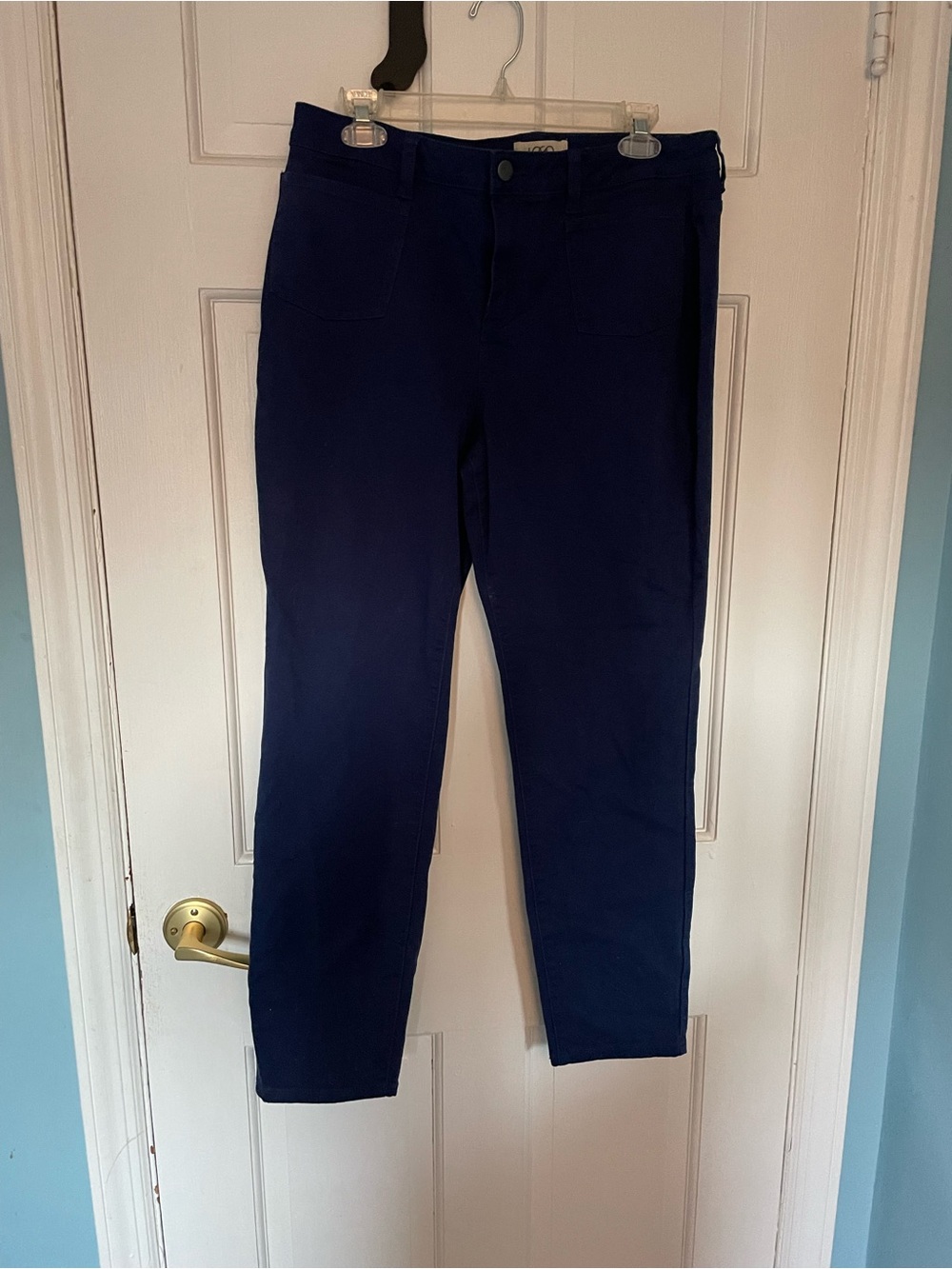Logo by Lori Goldstein Navy blue skinny jeans